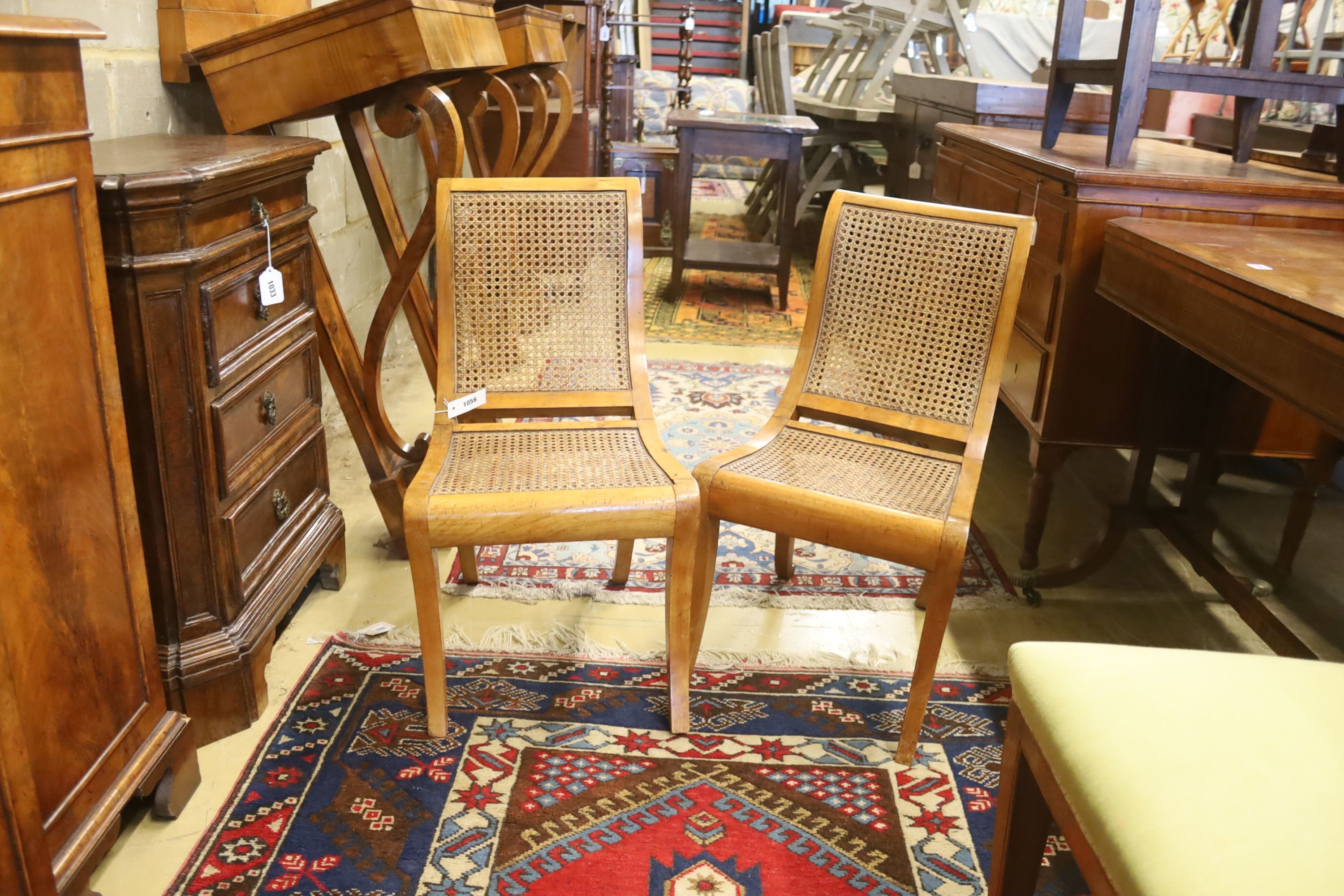 A pair of Italian caned side chairs